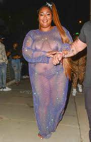 Lizzo Wore a Nearly-Naked Crystal Dress to Cardi B's Birthday Party