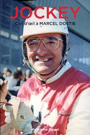 Madeleine Gagné « JOCKEY Clin d'œil à MARCEL DOSTIE » Marcel Dostie est un  champion. Un vrai champion**. ** Aux années 1967 et 1971, il a reçu le  titre de meilleur conducteur