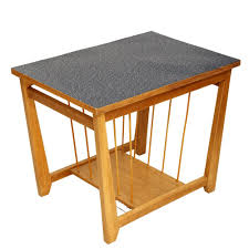 Top view of cup of aromatic coffee, business newspaper and blank notebook on wooden table. Coffee Table With Newspaper Holder Poland 1960s 109223