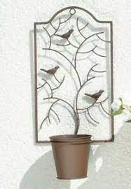 Hier spielt neben der farbwahl der einsatz von schönen zimmerpflanzen und schnittblumen, textilien in harmonierenden größen. Blumentopf Wandhalter Wand Deko Metall Fur Einen Topf Wandtopfhalter Ebay