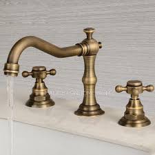By Changing A Faucet To Something Like This One Antique Brass Bathroom Faucet Will Aid Antique Brass Bathroom Faucet Brass Bathroom Fixtures Bathroom Faucets