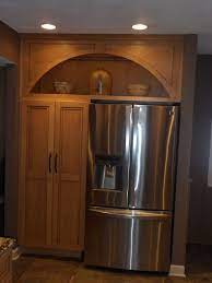 Space Above The Refrigerator And Pantry Was Accented With An Open Cabinet Completed With A Custom Arc Lake House Kitchen Homestead Kitchen Kitchen Room Design