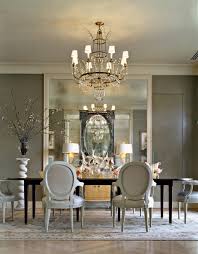 Accent chairs and accessories continue the color scheme throughout the space. Dining Room Ideas Stellar Interior Design