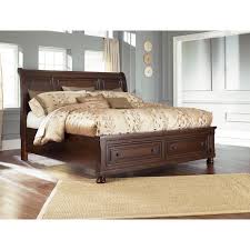 The warranty covers defects such as major wood cracks, veneer pops, visual wear and tear on upholstery, or malfunctioning of reclining. Zelen Grey Panel Bed Bernie Phyl S Furniture By Ashley Furniture