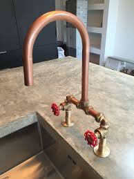 brass and copper. bespoke kitchen with