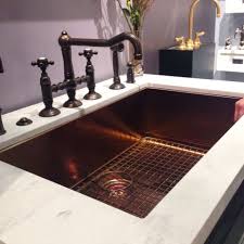 Click to see full answer. Available Now Stainless Steel Sink In A Copper Finish Oil Rubbed Bronze Traditio Bronze Kitchen Sink Stainless Steel Farmhouse Sink Oil Rubbed Bronze Faucet