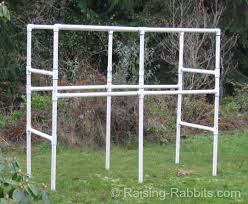 Lay a piece of plywood that measures 3 feet (0.91 m) by 2 feet (0.61 m) across the bottom frame on one side. Build A Rabbit Hutch With A Pvc Frame For Durability And Easy Cleaning