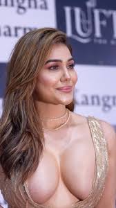 Explore Kangna Sharma's curvy boobs in high-quality galleries