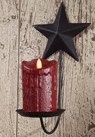 Buy top selling products like danya b™ contemporary wall sconce with medallions (set of 2) and ridge road décor leafy vine iron candle. Black Star Pillar Candle Sconce Allysons Place