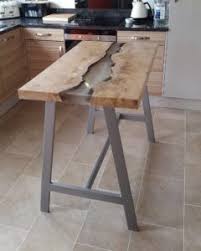 It's crafted from a mix of solid and engineered wood in a light brown and espresso hue that blends in easily with any color palette. Bar Height Kitchen Table Unique Wild Wood Furniture