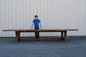 Dining table dimensions vary widely and it's better to have a narrow dining table with sufficient clearance on all sides than a wide table and not enough clearance. Hand Crafted Live Edge Walnut 14 Long Conference Or Dining Table By Corey Morgan Wood Works Custommade Com