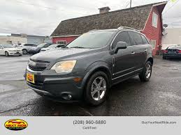 Image result for Silver Topaz 2013 Captiva