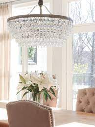 Glass chandeliers reflect elegance and style; Pin By Meghann Gormley Musial On B E A U T I F U L I N T E R I O R S Dining Chandelier Dining Room Lighting Dining Room Chandelier