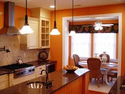 Orange Kitchen With A Tile Backsplash Orange Kitchen Walls Orange Home Decor Orange Kitchen