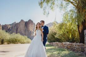 On the shaded lawn you'll find a heated swimming pool and shuffleboard court. Rustic Outdoorsy Saguaro Lake Ranch Wedding Andria Michael Alyssa Campbell Photography