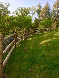 Split rail fences are constructed out of timber logs, typically split in half lengthwise to form the rails. Middlebury Fence Split Rail Fencing In Vermont