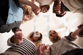 Police chief calvin williams and protesters come together in prayer at public square. Group Of Girls Holding Hands And Praying Photo Lightstock