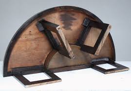 This round coffee table adds the perfect amount of modern minimalist design to any space. Harvey Probber Style Semi Circle Coffee Table With Inserted Copper Planter For Sale At 1stdibs