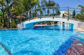 Garden holiday village, majorca picture: Stone Bridge Over The Outdoor Pool Stock Photo Picture And Royalty Free Image Image 83091286