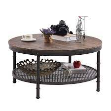 You can opt for a refined stone and metal table, stick with something more rustic like handcrafted wood, or even go for with an upholstered option to add a layer of comfort. Greenforest Coffee Table Round 35 8 Industrial 2 Tier Sofa Table With Storage Open Shelf And Metal Legs For Living Room Rustic Walnut Buy Online At Best Price In Uae Amazon Ae