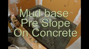 A shower pan is typically boxed in by three walls and a stubby curb. How To Install Mud In A Shower Floor Youtube