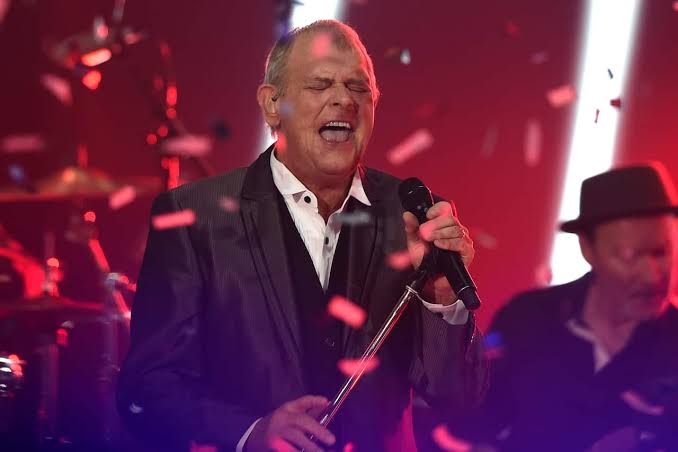 John Farnham to skip tribute concert amid worsening health, family says |  SBS News