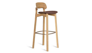 No matter the materials — wood, copper, or any other — they offer a stylish and comfortable place to sit. Zeitraum Nonoto Bar Chair Upholstered High Dopo Domani