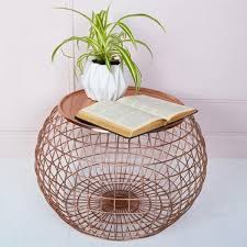 To find out how long your coffee table should be, you should first measure how long your couch is. Wire Basket Coffee Table