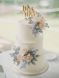 Specializing in stunning sugar flowers to truly give your wedding cake a showstopping display. Wedding Cakes 6 10302016 Km Modwedding Wedding Cake Flowers Blue Gold Wedding Cake Wedding Cakes Blue