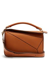 For example, 2mm red is not exactly the same as 1.2mm red. Tan Puzzle Medium Grained Leather Cross Body Bag Editorialist