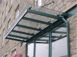 A Fully Decorated Mild Steel Support Framework Fixed Back To Internal Steelwork Provided The Basic Design For This Attractive Canopy Glass Awning Shade Canopy