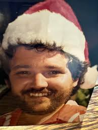 A.W. Langkilde and Brothers service station worker. Look no shoes kalofae.  Anyone recognize him? Photo, 1956.