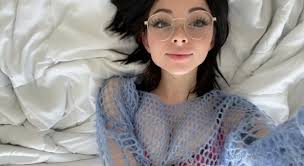 Noemie sticks her tounge out