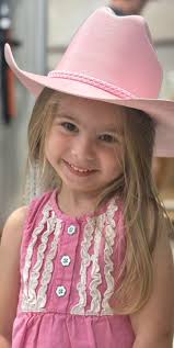 Maggie showing off her Turner hat at Ogletree's!