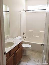 This bathroom features clean and simple furnishings and accessories for a fresh modern makeover. 50 Inspiring Bathroom Updates Southern Hospitality