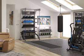 A wood plank wall, like this one by @themcnallys_mistley, adds texture and warmth to a home gym. 25 Home Gym Decor Ideas For Your Apartment Rent Com Blog