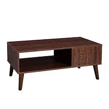 A smooth white table top is accented by oak wood legs with a rich, walnut wood grain. Vasagle Retro Coffee Table Cocktail Table Mid Century Modern Accent Table With Storage Shelf For Living Room Buy Online In Bahamas At Bahamas Desertcart Com Productid 142465267