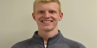 Maroons swim past Grand Haven