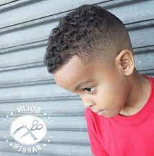 This is a stylish black boys' haircut that features a burst fade on the sides with sponge curls on the thick hair top. Pin On Cake Recipes