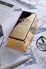 Gold Bullion Bar On A Stocks And Shares Chart