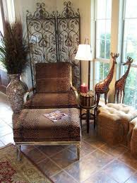 Often with period properties the features which we love the most, such as think about living room wallpaper designs to complement your lounge. Safari Home Decorating Ideas Unique Living Room Decorating Theme With Animal Print Chair Fold Decoration Interieure Africaine Deco Interieure Deco Africaine