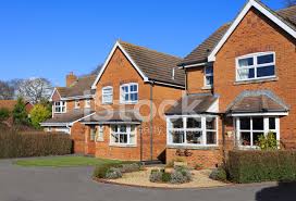 Sited between a suburban development and a protected wooded area, the bridge house appears as a. Modern Suburban Family Houses Stock Photos Freeimages Com