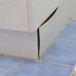should you tile under bathroom vanities