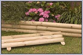 In addition to perennials, it exhibits the softscape only begins to tell the story of this flower garden border as the hardscape nicely complements the plantings. Best Beautiful And Cheap Wood Lawn Edging Ideas Decor Renewal Landscape Edging Diy Landscape Timber Edging Wood Garden Edging