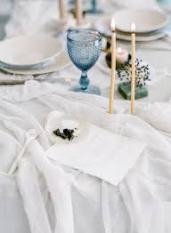 Serene Coastal Bridal Inspiration In Blue And Grey Hues Via Magnolia Rouge Wedding Reception Table Decorations Table Setting Decor Inspiration