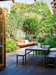 'it's the best way to screen off your outdoor room is by introducing hard landscaping in the form of pergolas or fences, or through plants. House Garden Decorating Ninemsn Homes Backyard Patio Garden Modern Garden Design