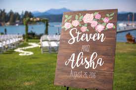 We nailed the diy wedding signs to a wooden post for our wedding but sadly no one got a photo. Diy Wooden Wedding Sign West Coast Lobster