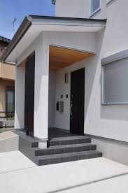 スロープの付いた玄関ポーチ こだわりの家づくり 玄関 屋根 おしゃれ 玄関ポーチ 玄関ポーチ 階段