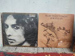 Solid Vinyl WallCovering . Have several rolls of the pink roses and white  and yellow stripe ..1 roll of blue w flowers . Prepasted .. peelable and  scrubbable . 56.4 SQ feet (