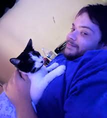 Cute baby kitties behind Midas by dumpster